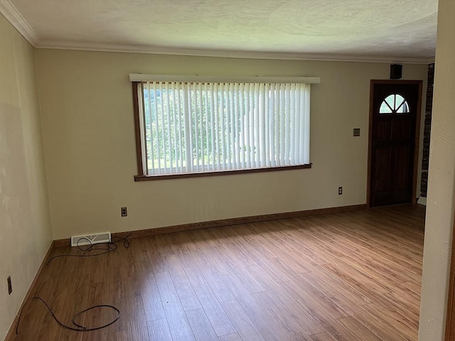 170 Canal St, Center Twp/Homer Cty, PA 15748 - unfurnished room featuring plenty of natural light, wood finished floors, and ornamental molding