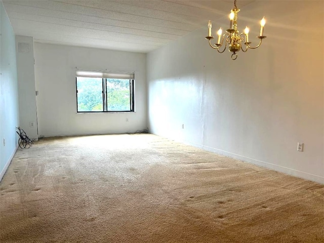 5715 Beacon St Unit 511, Squirrel Hill, PA 15217 - empty room with carpet flooring and a chandelier