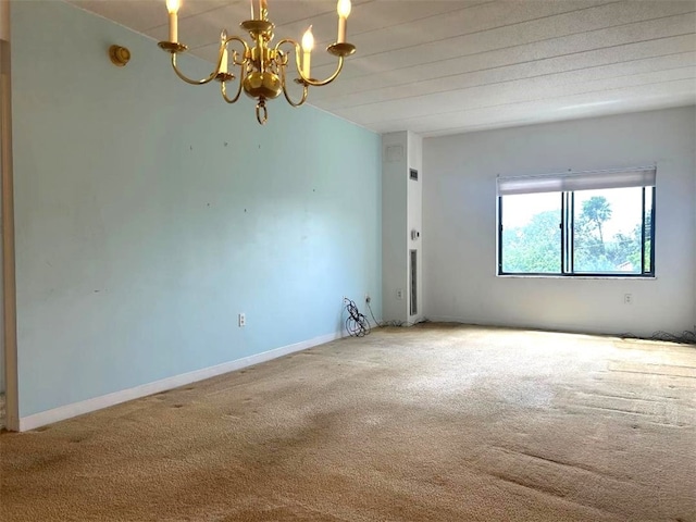 5715 Beacon St Unit 511, Squirrel Hill, PA 15217 - empty room with carpet flooring and a chandelier
