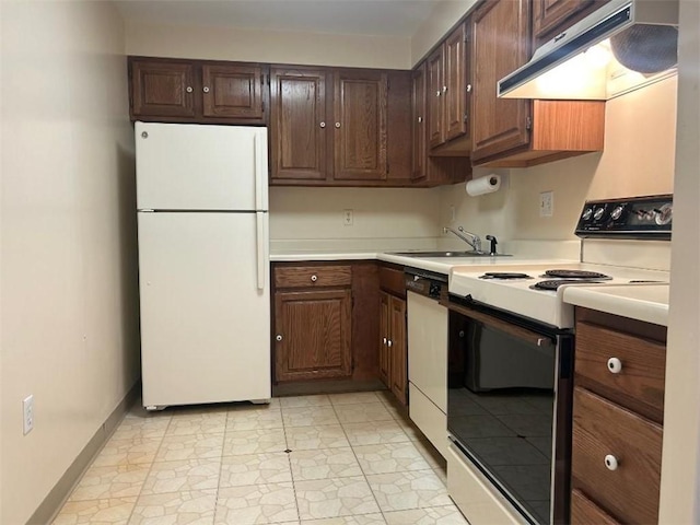 5715 Beacon St Unit 511, Squirrel Hill, PA 15217 - kitchen featuring white appliances, exhaust hood, light countertops, and dark brown cabinetry