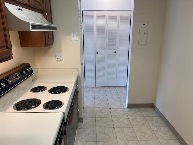 5715 Beacon St Unit 511, Squirrel Hill, PA 15217 - kitchen featuring under cabinet range hood, white electric range oven, and light countertops