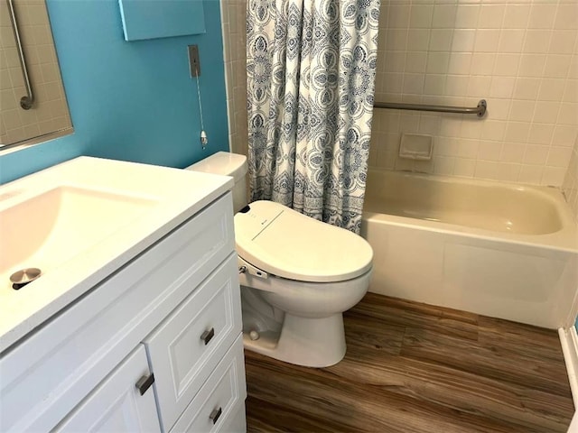 5715 Beacon St Unit 511, Squirrel Hill, PA 15217 - bathroom featuring wood finished floors, vanity, and shower / bath combo with shower curtain