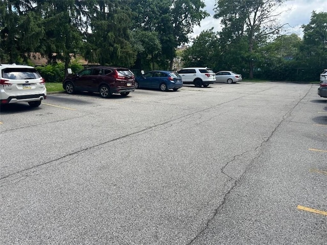 5715 Beacon St Unit 511, Squirrel Hill, PA 15217 - uncovered parking lot featuring view of scattered trees
