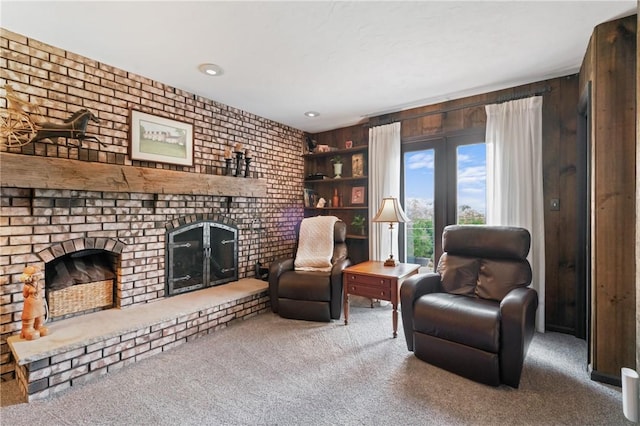 585 Taylor Dr, North Strabane, PA 15317 - living area featuring carpet, a fireplace, wood walls, and recessed lighting