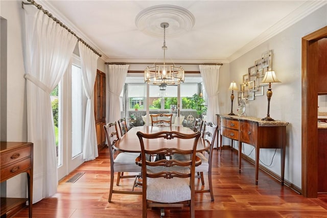 585 Taylor Dr, North Strabane, PA 15317 - dining room featuring a chandelier, crown molding, and light wood-style floors