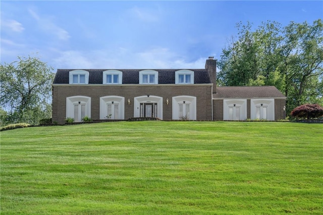 585 Taylor Dr, North Strabane, PA 15317 - view of front facade with a front lawn, a chimney, and mansard roof