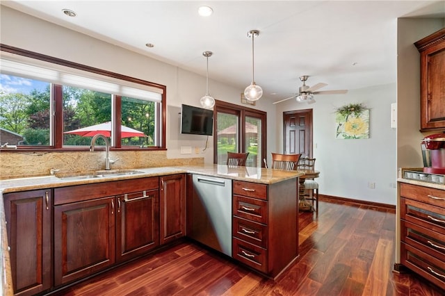 585 Taylor Dr, North Strabane, PA 15317 - kitchen with dishwasher, dark wood-style flooring, ceiling fan, a peninsula, and decorative light fixtures