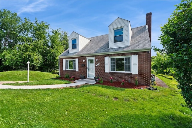 4057 Eliza St, West Mifflin, PA 15122 - cape cod house featuring brick siding, a front lawn, and a chimney