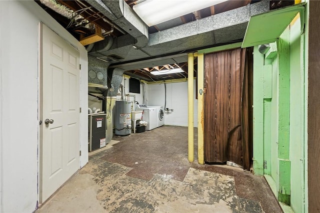 4057 Eliza St, West Mifflin, PA 15122 - unfinished below grade area with water heater and washer and clothes dryer