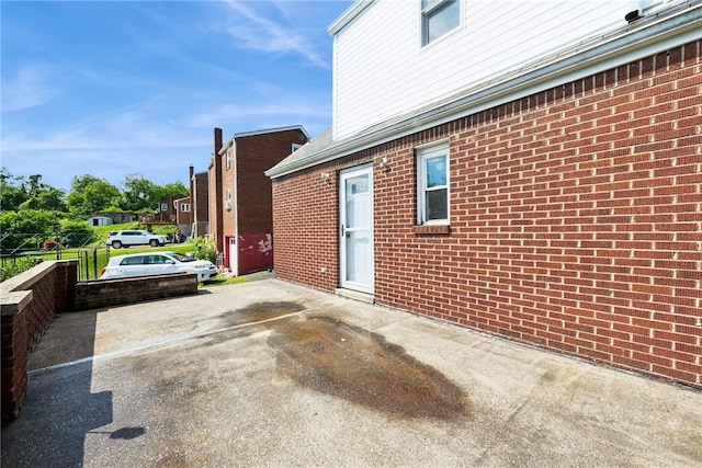 4057 Eliza St, West Mifflin, PA 15122 - view of patio featuring concrete driveway