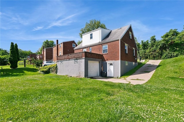 4057 Eliza St, West Mifflin, PA 15122 - back of house with brick siding and a yard