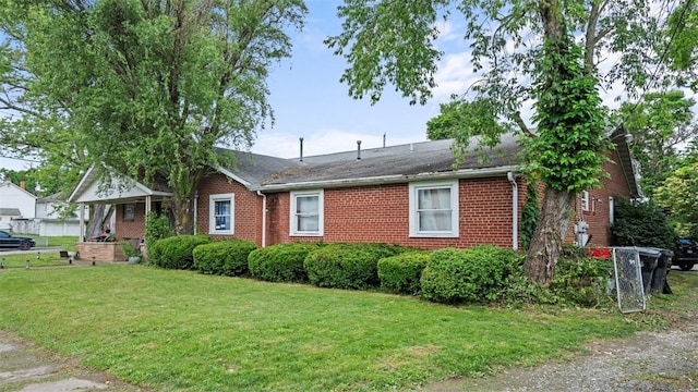 117 Carroll St, Aliquippa, PA 15001 - view of front of property with brick siding and a front yard