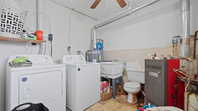 117 Carroll St, Aliquippa, PA 15001 - washroom with washer and dryer, ceiling fan, a heating unit, gas water heater, and tile patterned flooring