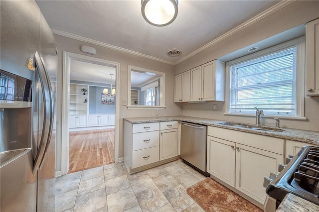 6833 Meade St Unit 17, Point Breeze, PA 15208 - kitchen featuring stainless steel appliances, crown molding, and light stone countertops