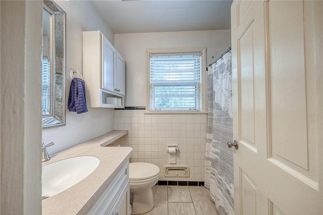 6833 Meade St Unit 17, Point Breeze, PA 15208 - bathroom featuring tile patterned flooring, tile walls, and vanity