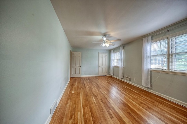 6833 Meade St Unit 17, Point Breeze, PA 15208 - unfurnished bedroom with light wood-style flooring, a closet, and a ceiling fan