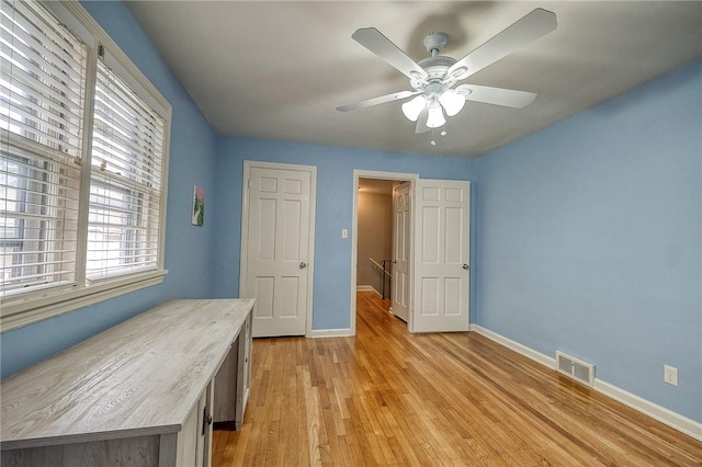6833 Meade St Unit 17, Point Breeze, PA 15208 - unfurnished bedroom featuring light wood-type flooring and a ceiling fan