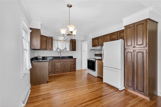 17 Fremont Rd, Pa, PA 15022 - kitchen with white appliances, dark countertops, a chandelier, light wood-style flooring, and under cabinet range hood
