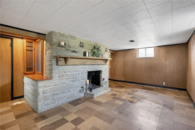 17 Fremont Rd, Pa, PA 15022 - unfurnished living room with wooden walls and a fireplace