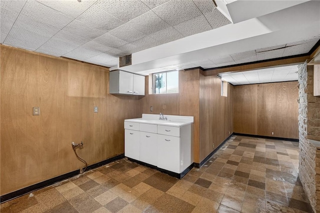 17 Fremont Rd, Pa, PA 15022 - below grade area featuring dark floors and wooden walls