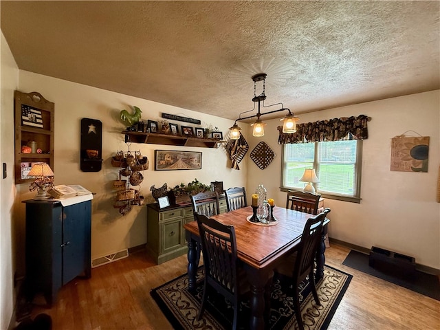 141 Carmichaels St, Dry Tav/Rices Landing, PA 15357 - dining space featuring a textured ceiling and dark wood-type flooring
