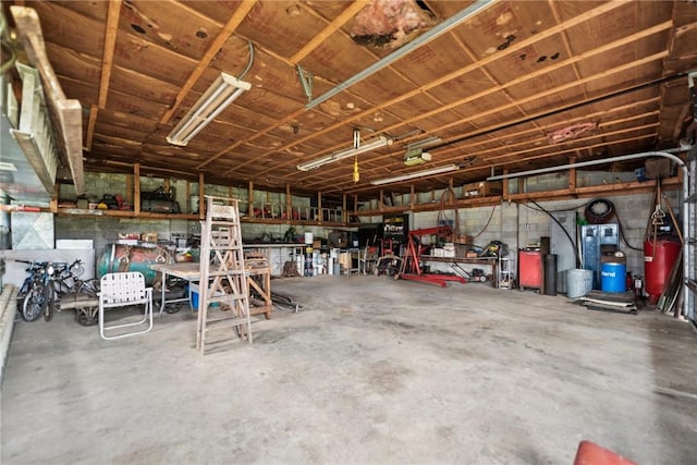 207 State Park Rd, New Alexandria, PA 15670 - garage featuring a workshop area
