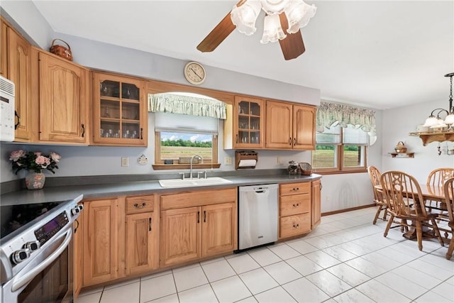 207 State Park Rd, New Alexandria, PA 15670 - kitchen with appliances with stainless steel finishes, plenty of natural light, glass insert cabinets, and ceiling fan