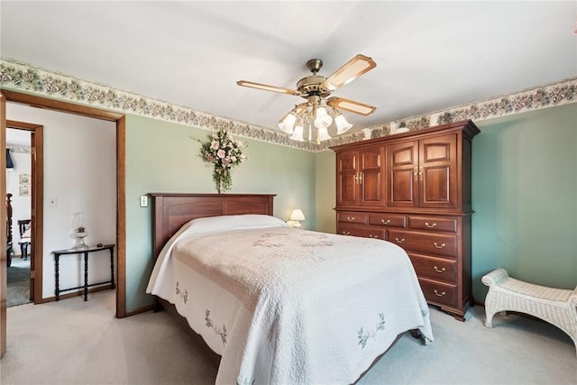 207 State Park Rd, New Alexandria, PA 15670 - bedroom with light carpet and a ceiling fan