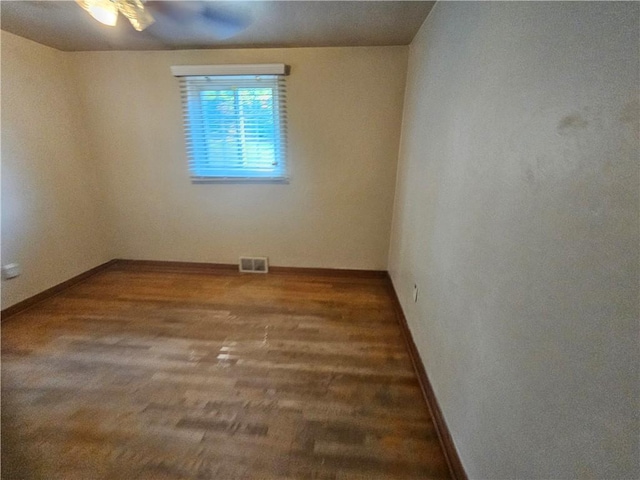 4235 Willow Ave, Castle Shannon, PA 15234 - spare room featuring baseboards and wood finished floors
