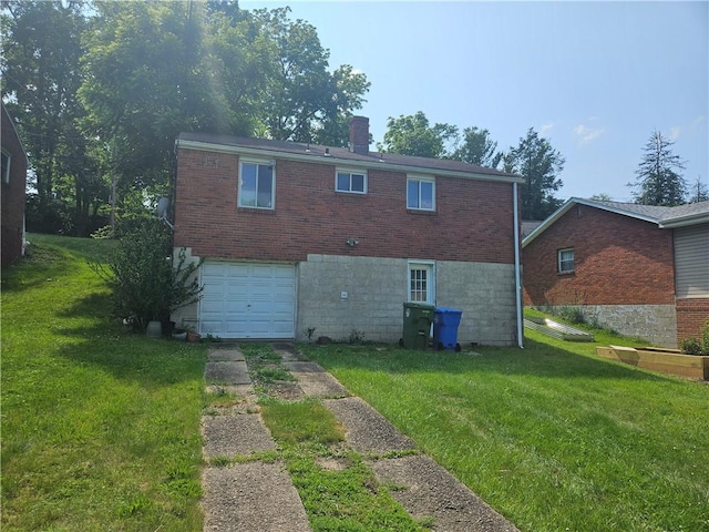 4235 Willow Ave, Castle Shannon, PA 15234 - back of property featuring concrete driveway, brick siding, an attached garage, and a lawn