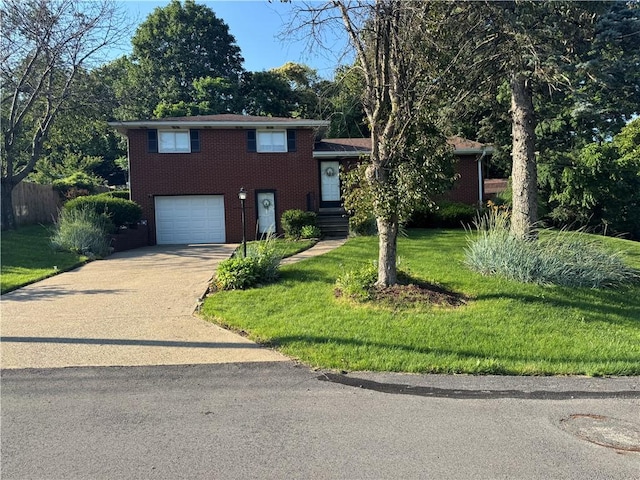 1306 Spring St, Derry Twp, PA 15650 - split level home with driveway, a garage, and brick siding