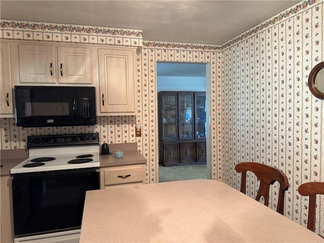 1306 Spring St, Derry Twp, PA 15650 - kitchen featuring black microwave, white electric range oven, wallpapered walls, and light countertops