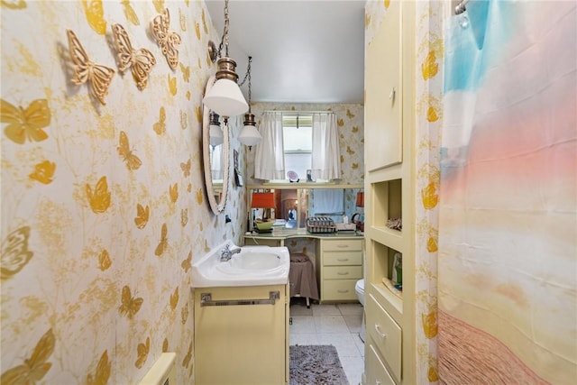 340 Weldon St, Latrobe, PA 15650 - full bathroom with vanity, wallpapered walls, and tile patterned flooring