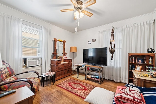 340 Weldon St, Latrobe, PA 15650 - living area with wood finished floors, ceiling fan, and crown molding