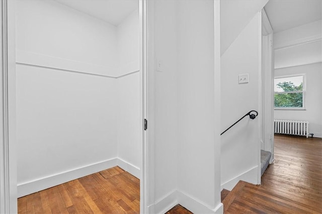 7032 Reynolds St, Point Breeze, PA 15208 - hall featuring radiator heating unit and wood finished floors
