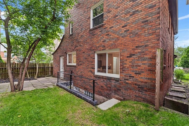 7032 Reynolds St, Point Breeze, PA 15208 - view of side of property featuring brick siding