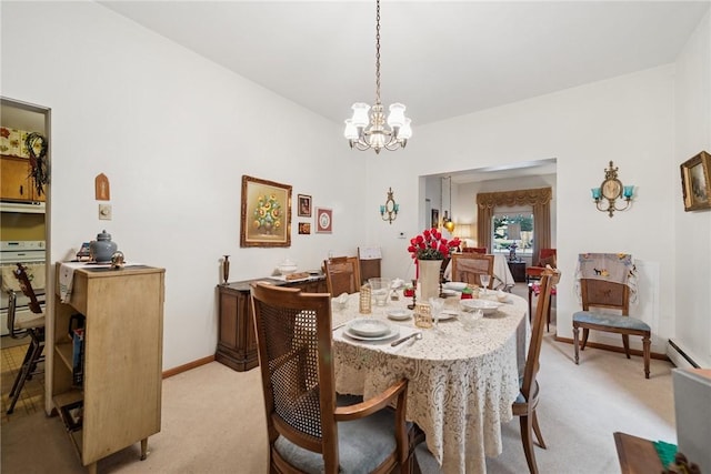 340 Weldon St, Latrobe, PA 15650 - dining room featuring a baseboard radiator, light colored carpet, and a chandelier