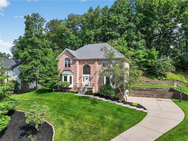 408 Bryn Ct, Ross Twp, PA 15237 - colonial inspired home featuring a front yard and brick siding
