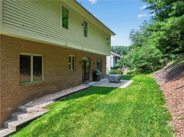 408 Bryn Ct, Ross Twp, PA 15237 - view of green lawn featuring a patio area