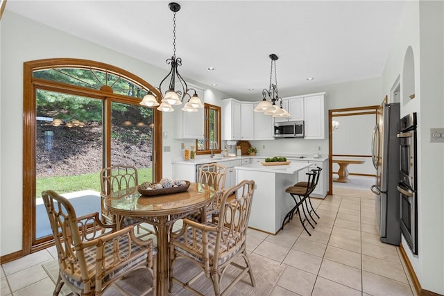 408 Bryn Ct, Ross Twp, PA 15237 - dining room with light tile patterned floors and recessed lighting