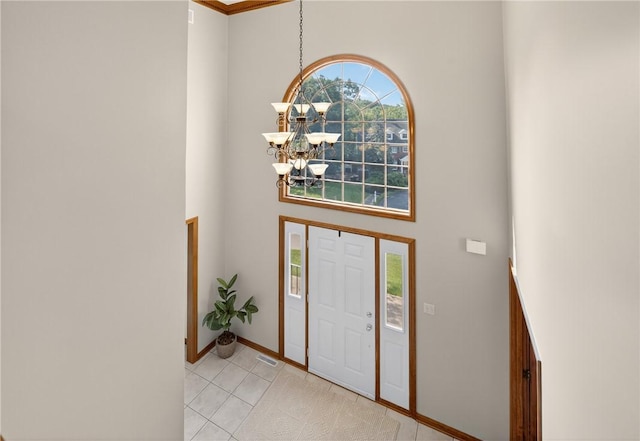 408 Bryn Ct, Ross Twp, PA 15237 - foyer entrance featuring a high ceiling, a chandelier, and light tile patterned floors