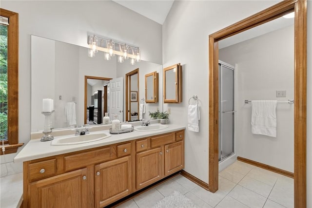 408 Bryn Ct, Ross Twp, PA 15237 - bathroom with double vanity, a shower stall, tile patterned floors, and lofted ceiling