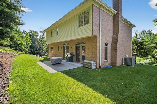 408 Bryn Ct, Ross Twp, PA 15237 - back of house with a chimney, a patio, and a yard