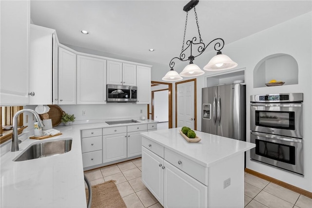 408 Bryn Ct, Ross Twp, PA 15237 - kitchen with stainless steel appliances, white cabinets, light countertops, light tile patterned floors, and recessed lighting