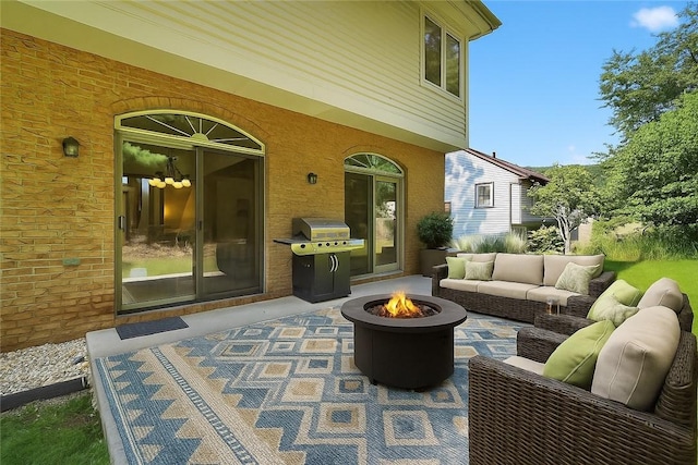408 Bryn Ct, Ross Twp, PA 15237 - view of patio featuring area for grilling and an outdoor living space with a fire pit