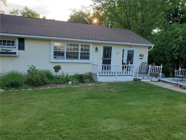 169 Orchard Dr, Brighton Twp, PA 15009 - view of front of house with a front yard and a shingled roof