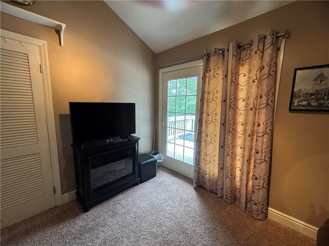 169 Orchard Dr, Brighton Twp, PA 15009 - carpeted living area featuring vaulted ceiling and baseboards