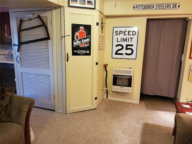 169 Orchard Dr, Brighton Twp, PA 15009 - corridor featuring heating unit and carpet flooring