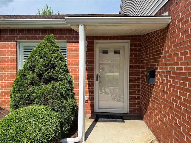 1523 Timothy Dr, Derry Twp, PA 15650 - view of exterior entry featuring brick siding