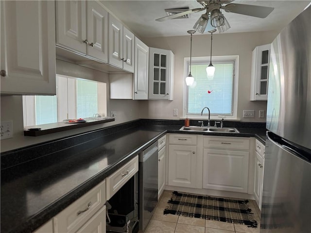 1523 Timothy Dr, Derry Twp, PA 15650 - kitchen featuring appliances with stainless steel finishes, ceiling fan, and white cabinets